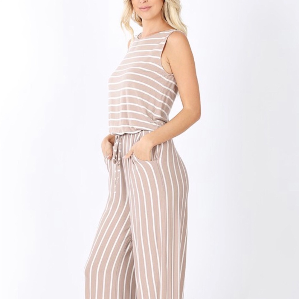 Super cute jumpsuit❤️ A must have only $20!